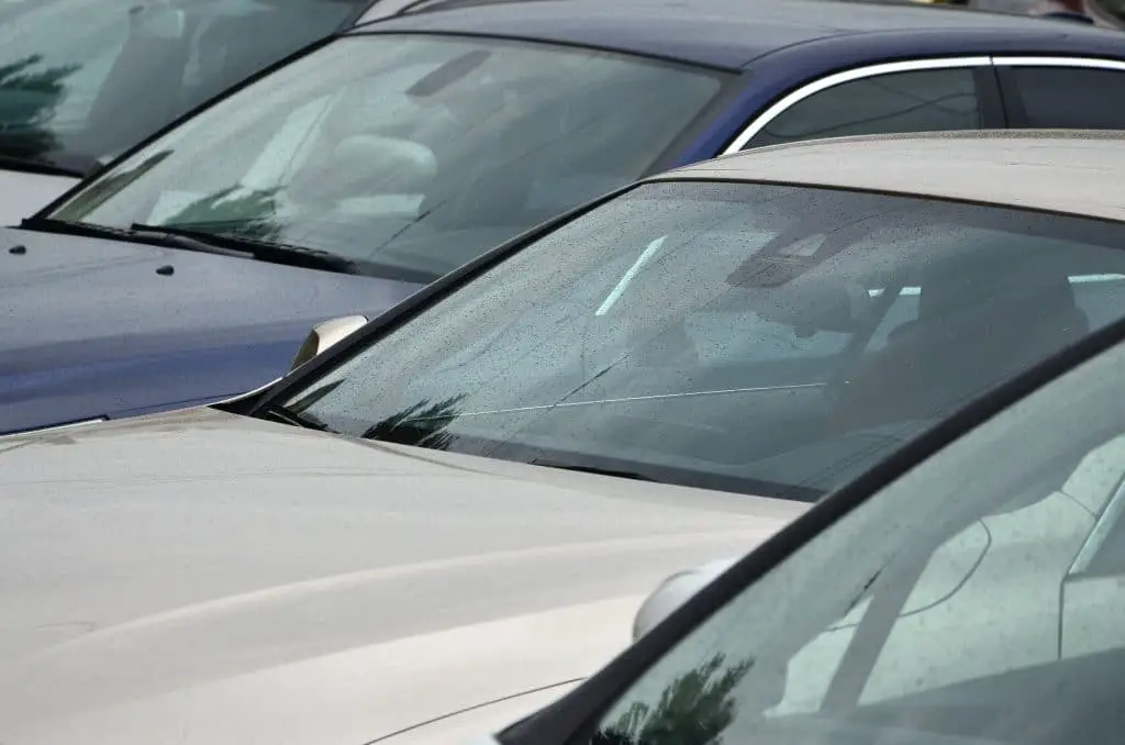 Roofs Of Several Cars. A Lot Of Cars Stand Close At Rush Hour