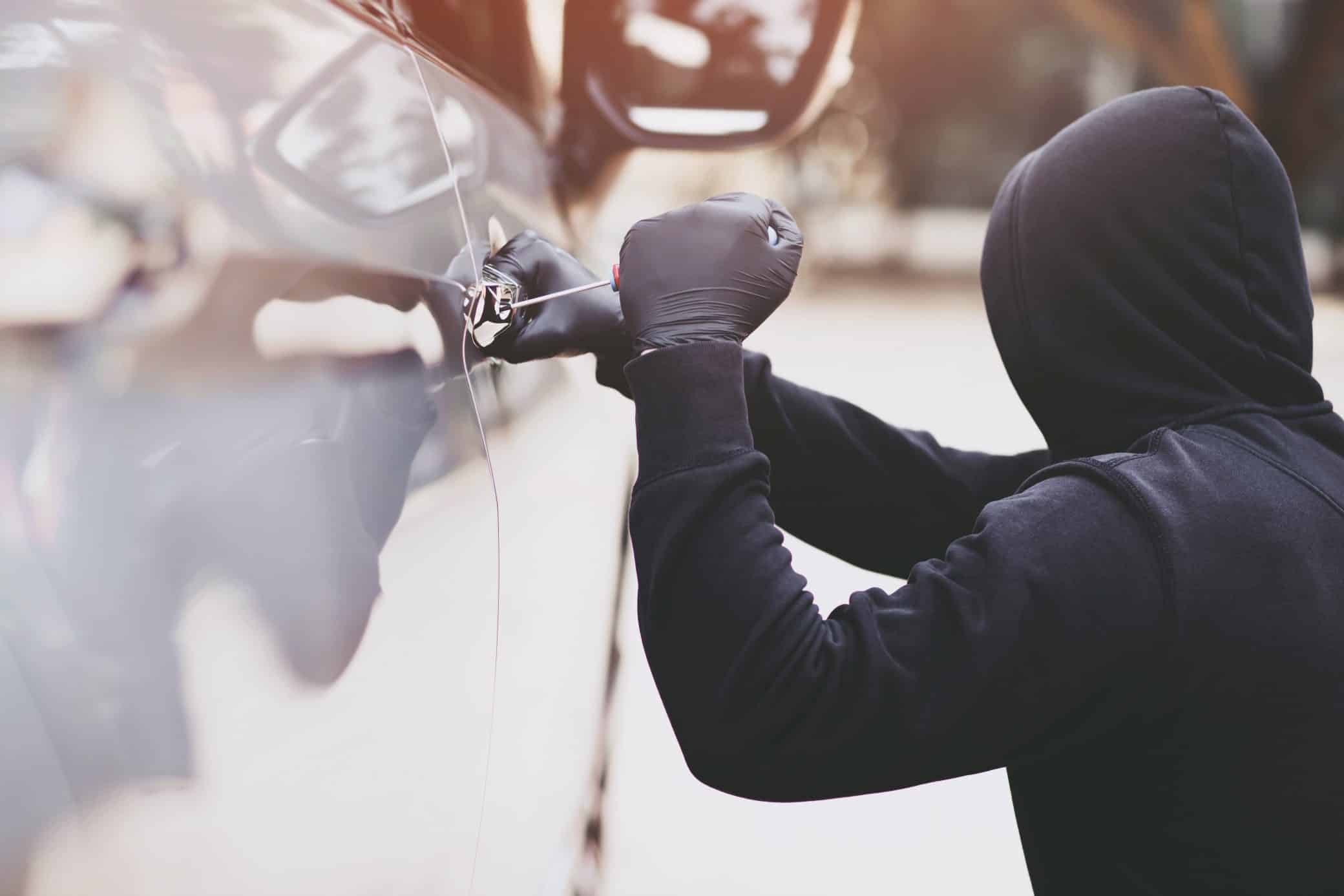 The Thief Is Stealing The Purse In The Car 2023 05 24 16 17 39 Utc