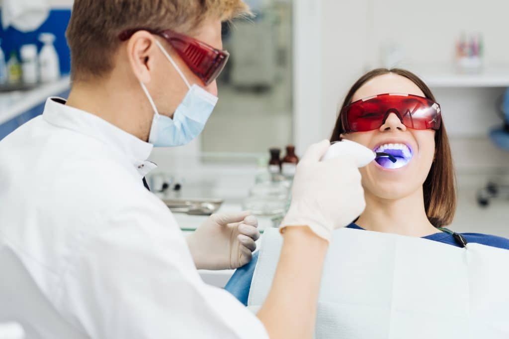 Young Woman Getting Dental Treatment.
