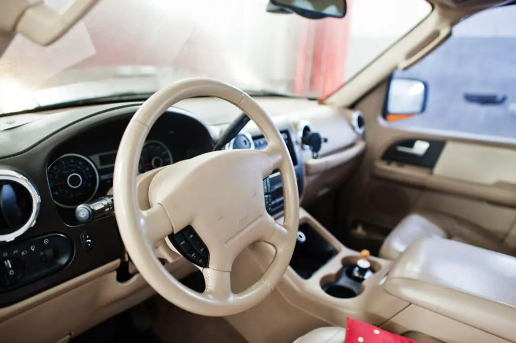 Interior Of American Suv Car On Stand In Workshop Of Service Sta