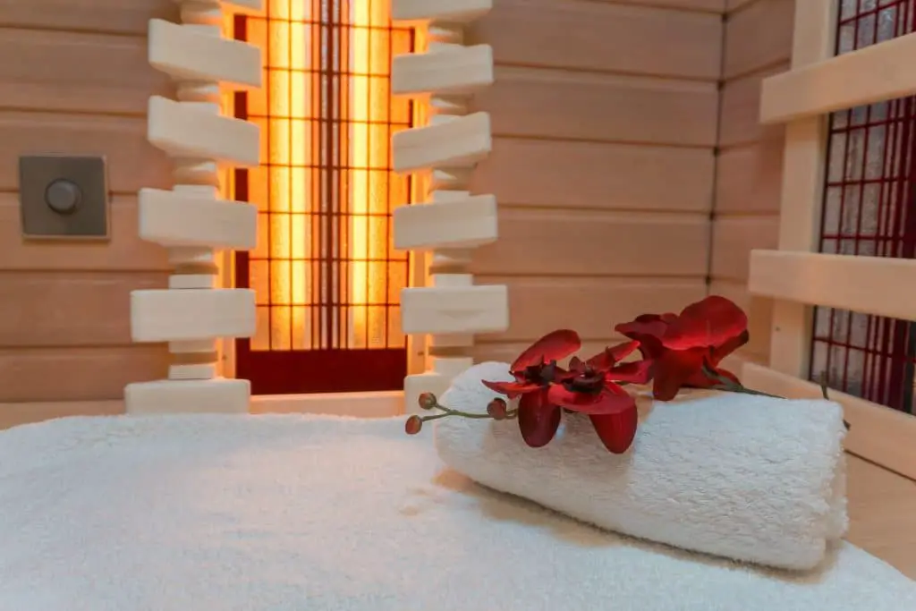 Infrared Cabin Interior With A White Towel And A Wonderful Flower