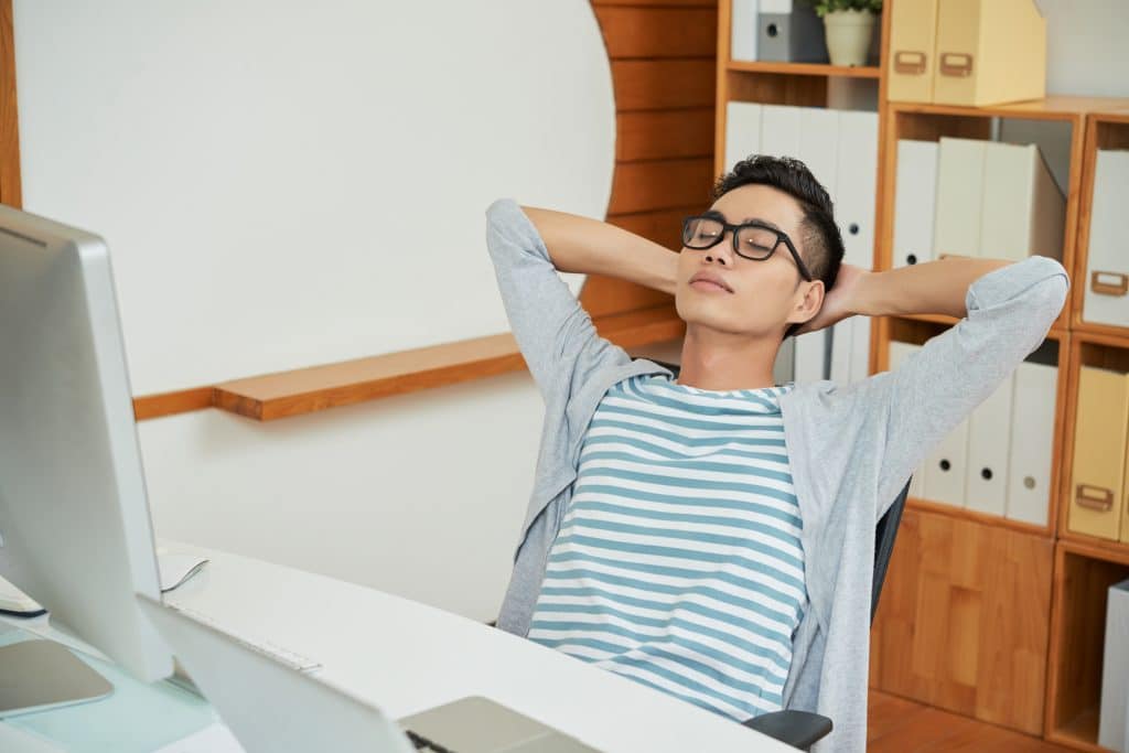 Resting Office Worker In Chair