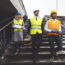 Construction Industry And Engineering Engineers, Architects And Contractors On The Construction Si