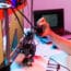 Man Student Makes The Item On The 3d Printer